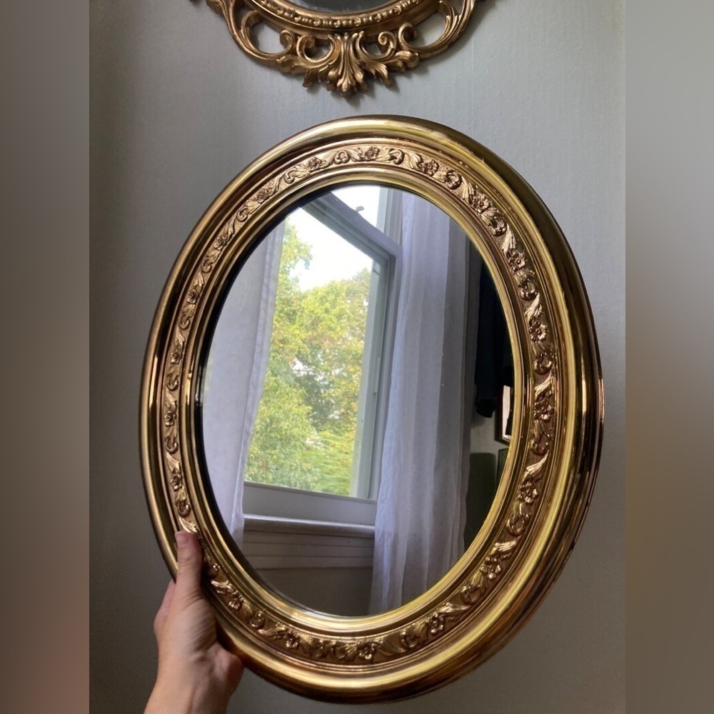 beautiful vintage gold plastic oval mirror